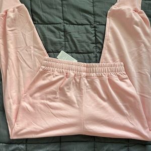 pink yoga style sweatpants.
